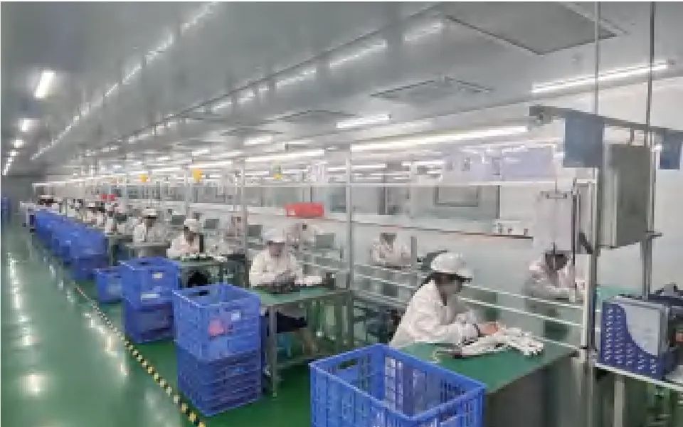 Assembly workers at the partner factory in Shenzhen